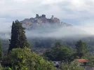 Hilltop-village-in-the-mist2.webp