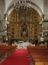 Retablo_(desaparecido)_del_santuario_de_la_Virgen_de_la_Barca_(Mugía,_La_Coruña).webp