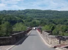 032-01 Crossing the bridge over River Lot out of St. Come d'Olt.webp