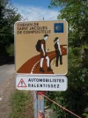 032-03 Be careful of pilgrims. A sign on the road to Espalion.webp