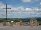 034-19 Cross and St. Jacques sculpture in Golinhac.webp