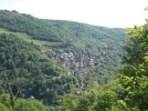 037-07 View of Conques from the 300 metre steep climb out.webp