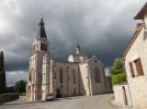 045-15 The church in Vaylats under a stormy sky.webp