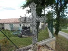 047-12 Boots on a wayside cross at La Roziere.webp