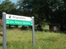 061-07 Sign at Manet points to a pilgrim refuge.webp