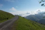 070-33 Two Pilgrims coming in to the Pilgrim Refuge at Orisson in the Pyrenees.webp