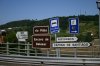 1500-signposts on bridge over rio Mino before Portomarin (Morgade-Ventos de Naron, 19.06.2011).jpg